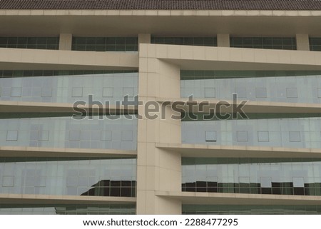 The glass of the building where the lecture is located looks so clean and tall