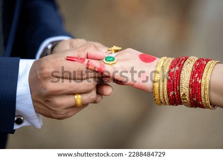 Ring ceremony in Nepalese wedding. Royalty-Free Stock Photo #2288484729