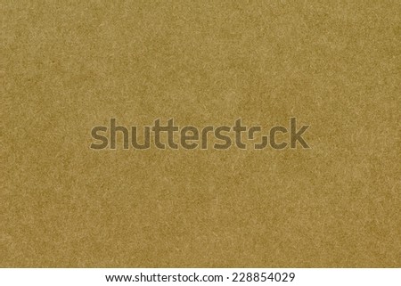 Brown paper texture closeup photo background.
