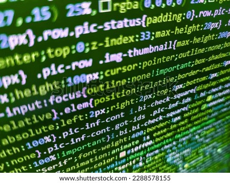 Programmer working of software. Programing. Php code on blue background in code editor. . Simple website HTML code with colorful tags in browser view on dark background. Program development concept