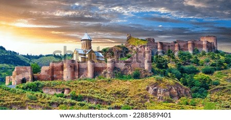 Picturesque sunrise over the ancient Narikala fortress in the city of Tbilisi, Georgia Royalty-Free Stock Photo #2288589401