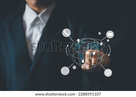 Businesswoman touching on virtual screen contact icons ( email, address, live chat, internet wifi ). Contact us or Customer support hotline people connect. Worldwide service coverage.