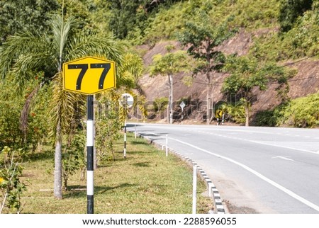 Yellow road sign in Malaysia