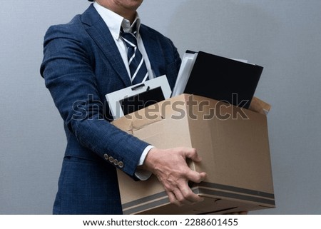 A middle-aged man who was dismissed due to personnel reduction Royalty-Free Stock Photo #2288601455