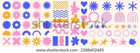 Trendy abstract shapes. Flower, star, wave, heart, circle, spiral. Retro groovy aesthetic. Modern 90s - 2000s style. Elements for posters design, stickers. Vector illustration. Royalty-Free Stock Photo #2288602685