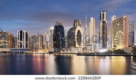 Panoramic view of Dubai Creek and night city skyline, United Arab Emirates, night Dubai ultra modern skyline Royalty-Free Stock Photo #2288642809