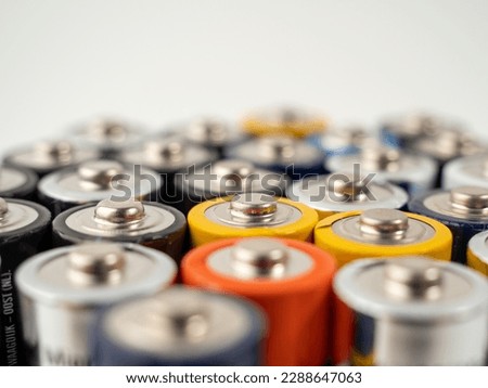 Batteries are alkaline. selective focus. The concept of energy sources and their use. Lots of AA batteries. Royalty-Free Stock Photo #2288647063