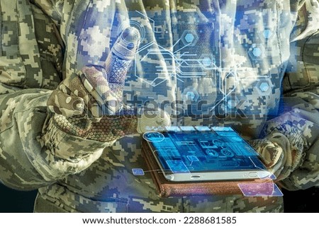 AI Command of the military forces on the tablet computer with augmented reality. Internet, Programming control with artificial intelligence, online coordination of the military team Royalty-Free Stock Photo #2288681585