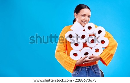 Toilet paper, happiness and woman portrait with mockup and home inventory stock. Isolated, blue background and studio with a young female holding tissue rolls with a happy smile and joy with mock up Royalty-Free Stock Photo #2288693673