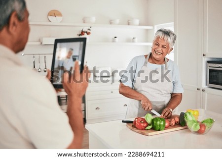 Kitchen cooking, elderly couple or tablet photo of senior woman, wife or person with online memory picture. Nutritionist food, love or laughing people bonding, happy and prepare vegetable ingredients
