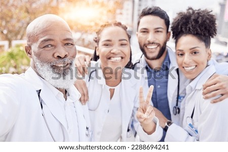 Selfie, peace and collaboration with a team of doctors posing outdoor together while working at a hospital. Profile picture, healthcare and medical with a group of friends taking a photograph outside