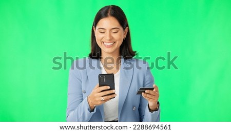 Business woman, phone and credit card on green screen for online shopping, ecommerce or purchase against a studio background. Happy female on smartphone for transaction, banking or finance on mockup