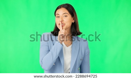 Green screen, happy woman and secret wink of face, finger on lips and business privacy. Portrait of female model, silence and quiet employee smile for gossip, whisper emoji and trust in surprise deal Royalty-Free Stock Photo #2288694725