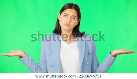 Business woman, open hands and palm by green screen for choice, decision and confused face in studio. Young businesswoman, hand gesture and portrait for product placement with mock up by background