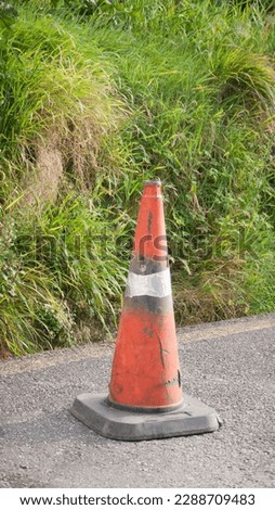 Weathered and dirty traffic cone