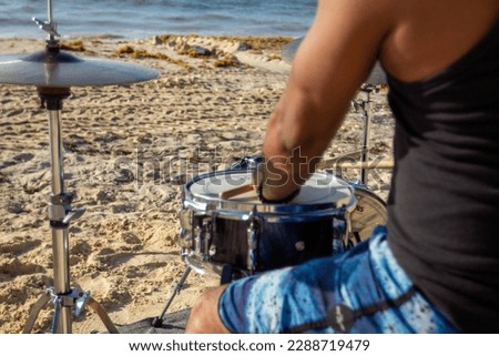 drum kit on the morning beach