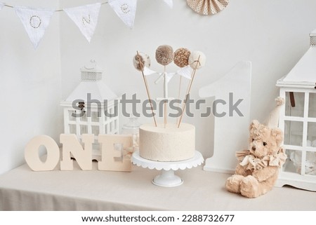 Happy birthday party background. Birthday decor and cake. One year celebration.