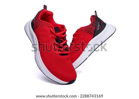 Red sneakers isolated on white. Royalty-Free Stock Photo #2288743169