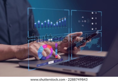 Analyst using computer to make report with KPI and metrics connected to database. Core Business Analytics and Data Management System. Corporate strategy for finance, Sales, Operations, Marketing.