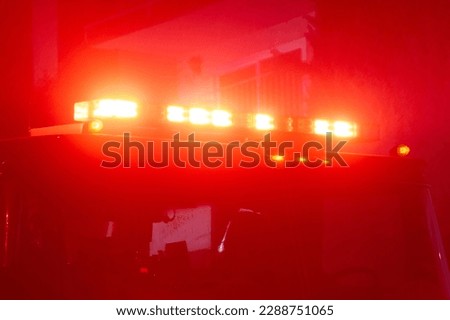 Fire engine flashing red lights