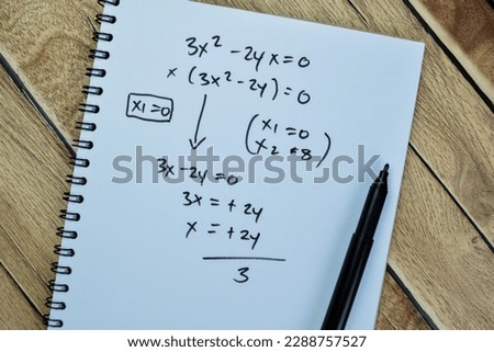 Concept of math formulas write on book isolated on Wooden Table. Royalty-Free Stock Photo #2288757527