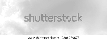 Black sky with white cloud. Dark background before Rainstorm. for wallpaper, backdrop and design. Royalty-Free Stock Photo #2288770673