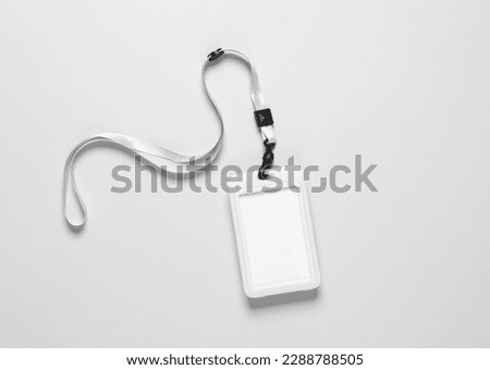Id card badge with belt on gray background Royalty-Free Stock Photo #2288788505