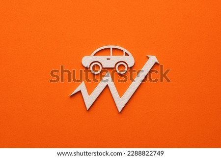 White car with upward arrow on orange background - Concept of rising car prices