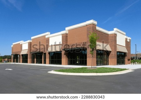 New suburban retail office building  Royalty-Free Stock Photo #2288830343