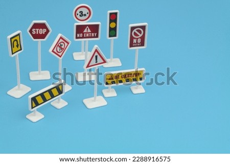 Traffic signs on blue background with copy space for text.
