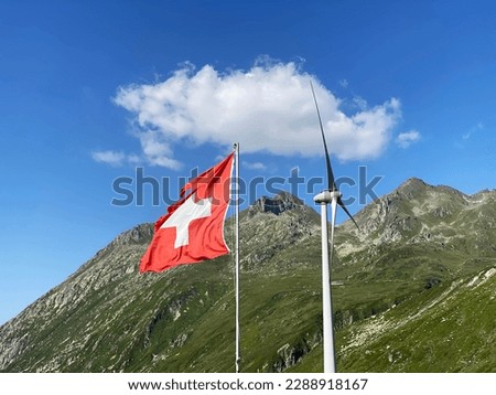 National flag of the Swiss Confederation (Flag of Switzerland - National Flag of Switzerland) and Gotthard wind farm or Windpark St. Gotthard - Investing in renewable energy sources (Schweiz)