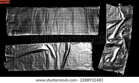silver adhesive tape isolated on black background. Aluminium foil waterproof tape set Royalty-Free Stock Photo #2288932483