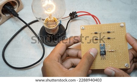 Trial electronics to make automatic LDR light sensor lamps, simple electronics projects using LDR components and incandescent lamps