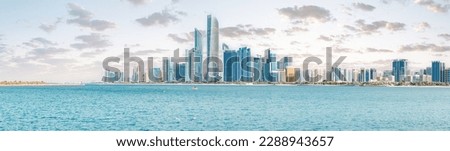sheer size and scale of Abu Dhabi's towering skyscrapers, a panoramic view that showcases the city's architectural magnificence Royalty-Free Stock Photo #2288943657