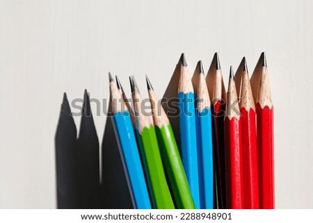 pencils in different colors in window