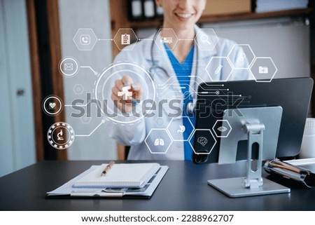 health care business graph data and growth, Medical examination and doctor analyzing medical report network connection on tablet screen. in hospital Royalty-Free Stock Photo #2288962707