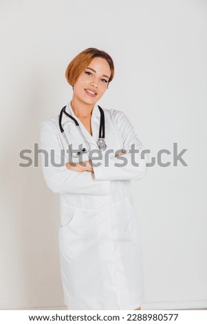 woman doctor in white coat with phonendoscope hospital cabinet health treatment