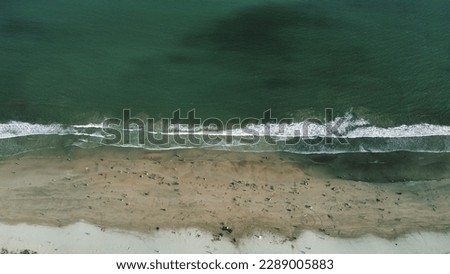 Aerial view of beach and bridge