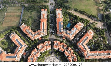 Aerial view of seaside neighborhood with red roofs