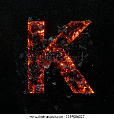 A photo of a burning capital letter K on a black background is made of hot coals.