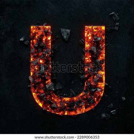 A photo of a burning capital letter U on a black background is made of hot coals.