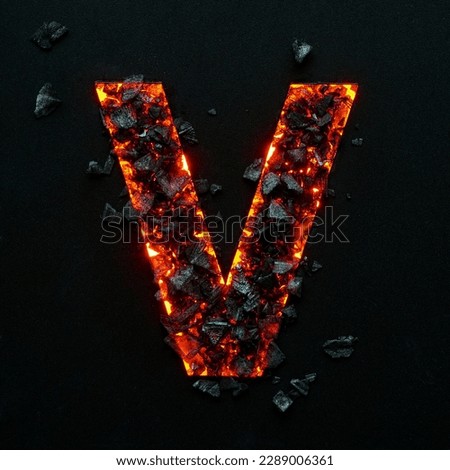 A photo of a burning capital letter V on a black background is made of hot coals.