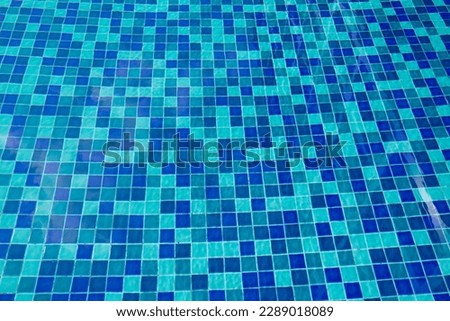 detail of swimming pool reflection under sunny day 