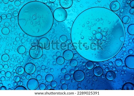 Blue abstract background with oil and water.  look like scientific image