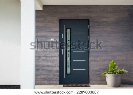 Facade of a modern building with modern doors Royalty-Free Stock Photo #2289033887
