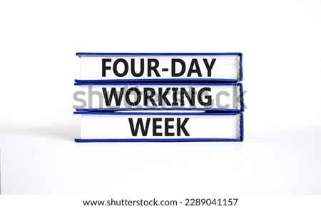 Four-day working week symbol. Concept words Four-day working week on books on a beautiful white table white background. Business and four-day working week concept. Copy space.