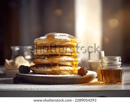 Pancakes with blueberries and raspberry and maple syrup delicious  Royalty-Free Stock Photo #2289054293