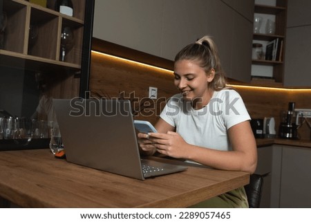 Young woman freelancer working on computer at home. Attractive businesswoman studying online, using laptop software, web surfing information or shopping in internet store. Internet job search concept