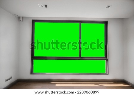 large glass windows in the room green screen