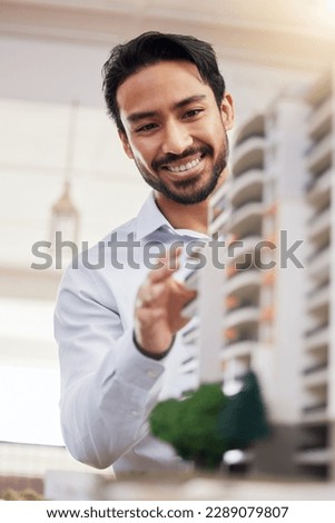 Architect, happy man and check architecture model, construction and building with smile on face and building project. Businessman in office, design and engineer, property development and construction Royalty-Free Stock Photo #2289079807